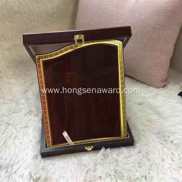 red wooden plaque with wooden box